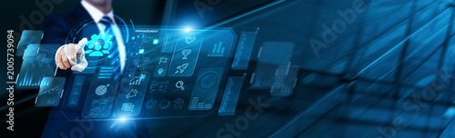 Operations Lead uses modern digital dashboard for Management data analysis, tracking resource allocation, monitoring departmental workflows, and ensuring overall organizational efficiency and output.