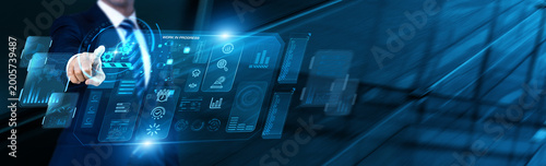 Photos Production Supervisor uses modern digital dashboard for Work In Progress data analysis, tracking ongoing manufacturing stages, and evaluating current operational bottlenecks in real-time