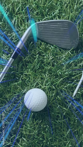 Vertical video: Shaft starting iron head sweep left, revealing tee and nudging ball for practice