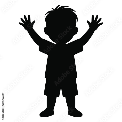 Black silhouette of a young boy with arms raised isolated on a white background silhouette