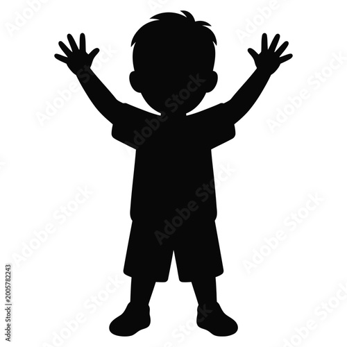 Black silhouette of a young boy with arms raised in celebration isolated on white background silhouette