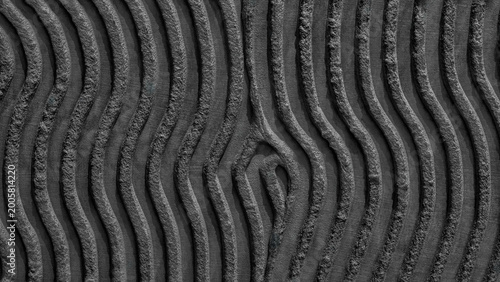 Foto Wide abstract black gray wavy volumetric textured rough grainy striped pattern o