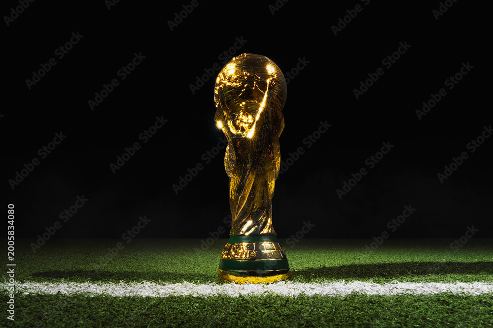 Naklejka premium 01.05.26. Frankfuer am Main, Hesse, Germany. World Cup Trophy Shines in Stadium Spotlight - A Celebration of Football.