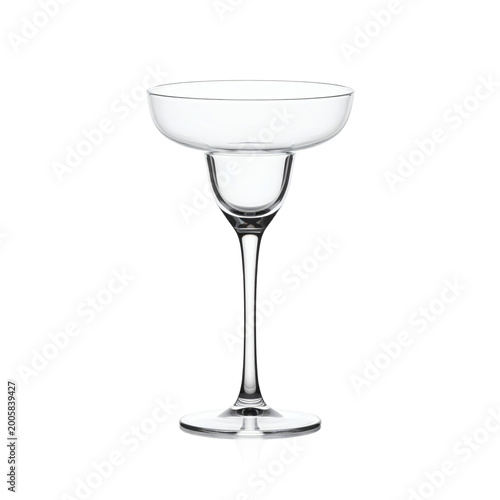 Elegant empty clear glass perfectly shaped for serving classic chilled margarita cocktails  