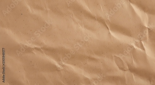 A crumpled brown paper background with creases and folds everywhere brown paper crumpled paper wrink