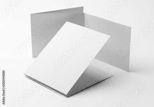 Three folded white paper sheets forming a geometric shape