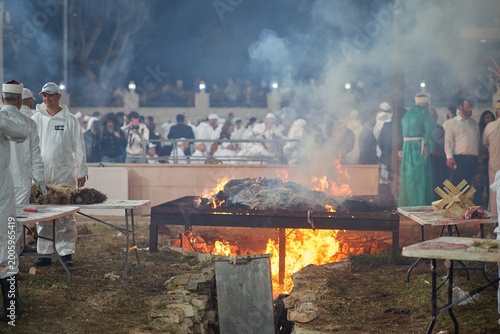 Samaritan community gathered around fire during Passover sacrifice ceremony