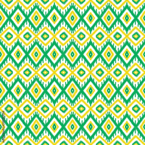 Green and Yellow Ikat Seamless Pattern with Geometric Diamond Ethnic Textile Background