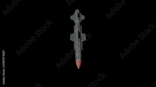 Missile isolated on black background. Cruise missile black background. Old combat rocket is in a dark night sky. Missile with dust grunge textures. Concept: missile attack. Rocket rotate.