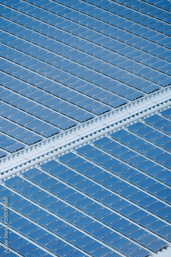 Solar cell panels background on clear warehouse roof top 