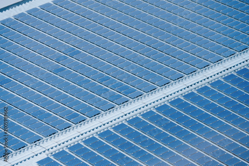 Solar cell panels background on clear warehouse roof top 