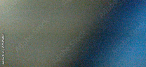 Schilderij op canvas A dark, out-of-focus abstract background with significant digital noise, showing a soft diagonal light grey glow against a deep charcoal base