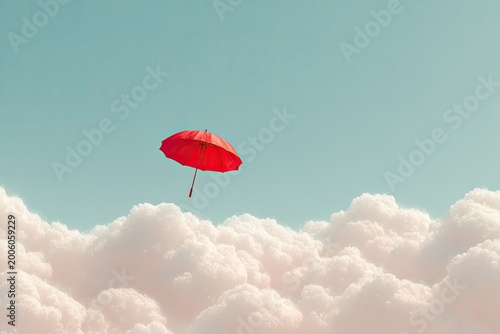 A bright red umbrella floats above soft, ethereal clouds