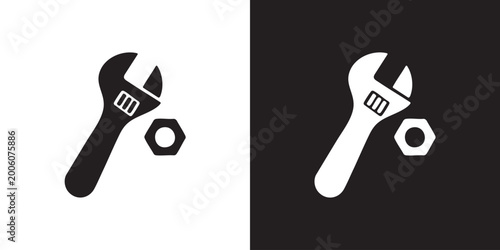 Konstfotografi Minimalist Silhouette of Adjustable Wrench and Hexagonal Nut in Black and White