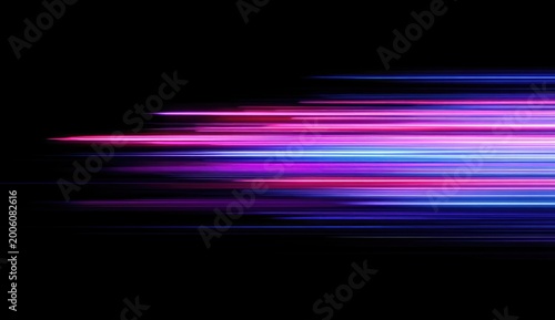 Streaks of vibrant pink and blue light race across a black background