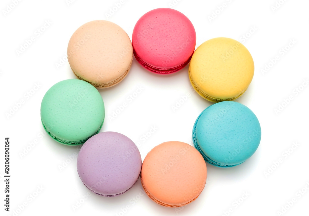 Fototapeta premium Colorful macarons arranged in a circle on a clean surface