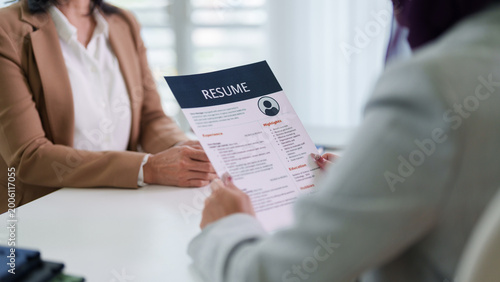 professional job interview businesswoman candidate holding resume document meeting with human resources recruiter discussing employment opportunity career