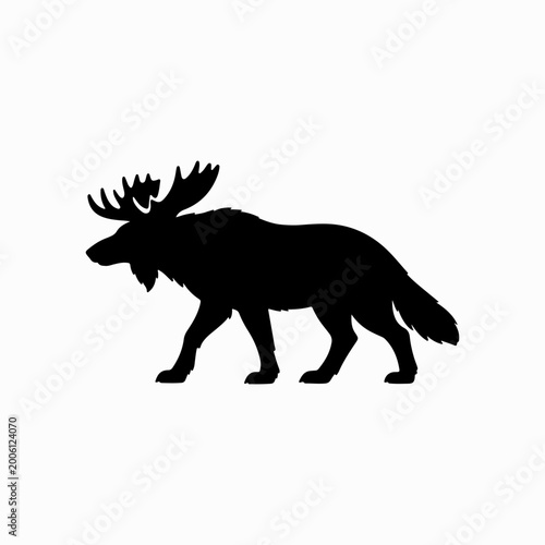 Moose silhouette walking in nature