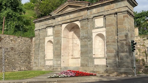 Bergamo, Italy. The old town. Landscape at the old fountain Saint Agostino in summer with flowers