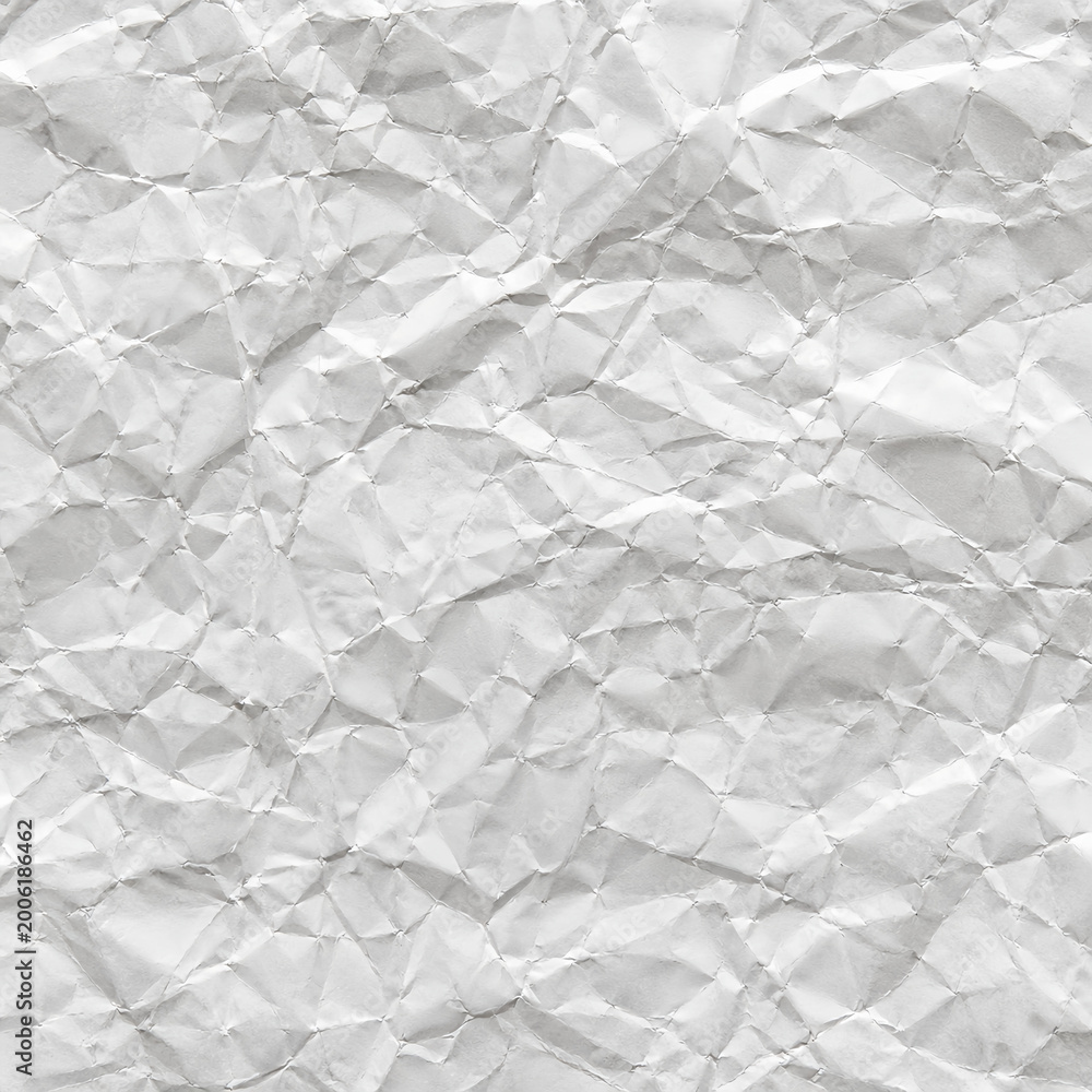 Fototapeta premium Crumpled white paper texture background with wrinkles and creases