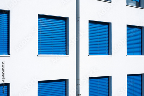 blue metal windows on white wall