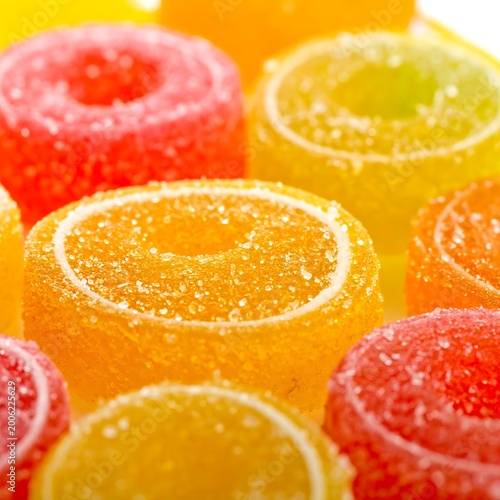 Colorful sugar-coated candies in various vibrant hues and shapes