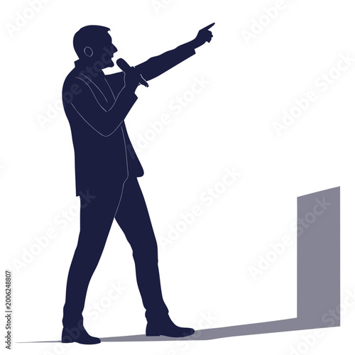 Photos Silhouette of a male speaker holding a microphone and gesturing with public spea