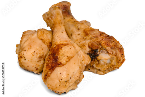 Fotografía Golden baked chicken drumsticks isolated on white background, chicken leg meat i