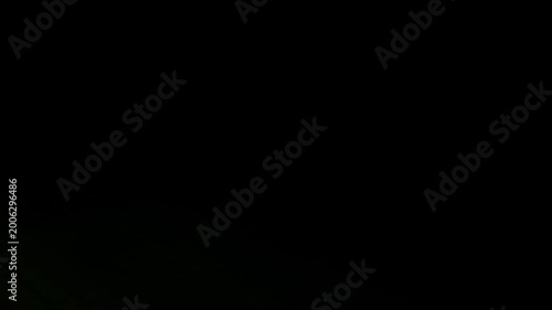 Abstract CRT strobe light glitches and scanlines. Vibrant RGB color streaks and analog signal distortion on black screen. Professional retro video transition and background overlay element.