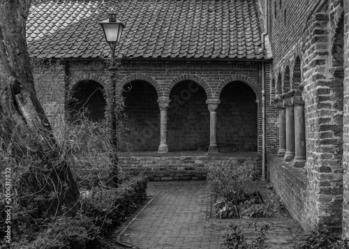 public garden with remains of an old monastery in black and white