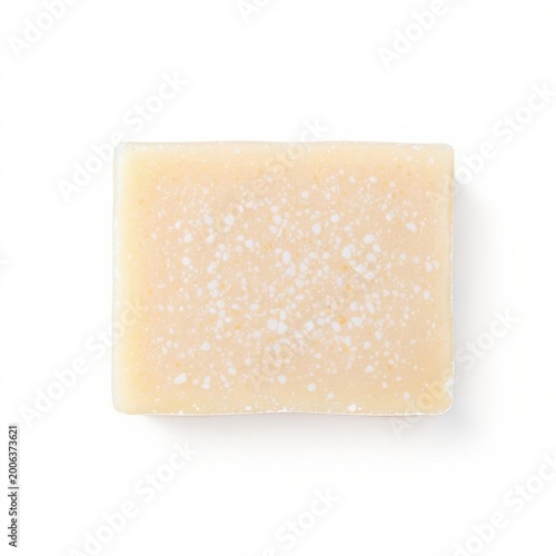 Studio Shot of a Square Yellow Bar Soap with White Flecks on White Background
