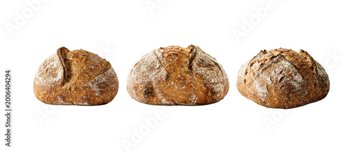 Obraz na płótnie Crusty artisan loaves: three round rustic breads dusted with flour, lined up on