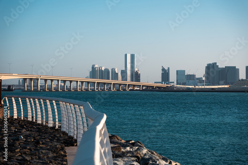 Abu Dhabi skyline with modern architecture, bridge and waterfront view