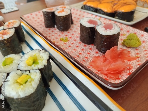 Sushi photo, Sushi is a typical Japanese dish that is famous throughout the world, made from rice seasoned with vinegar and combined with various fresh ingredients such as fish, seafood, vegetables an