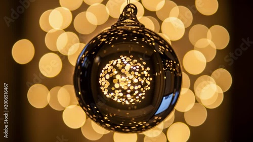Glowing crystal ball ornament with intricate light reflections