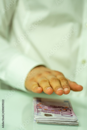 Close up of a hand about to...