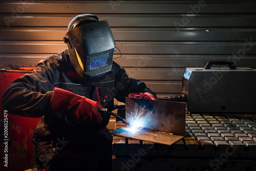 Crafting metal sparks in the evening workshop