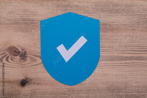 A simple blue shield with a...