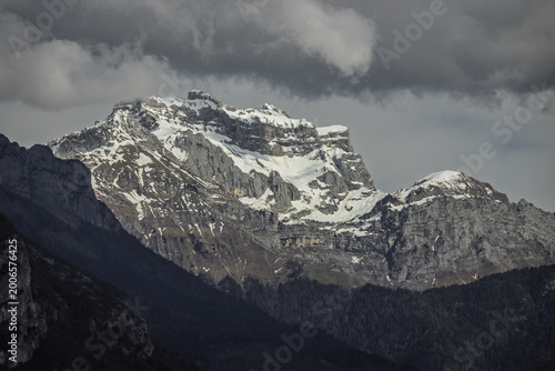 Dramatic view of La Tournette mountain peak with snow in the Bornes Massif, Haute-Savoie, France.