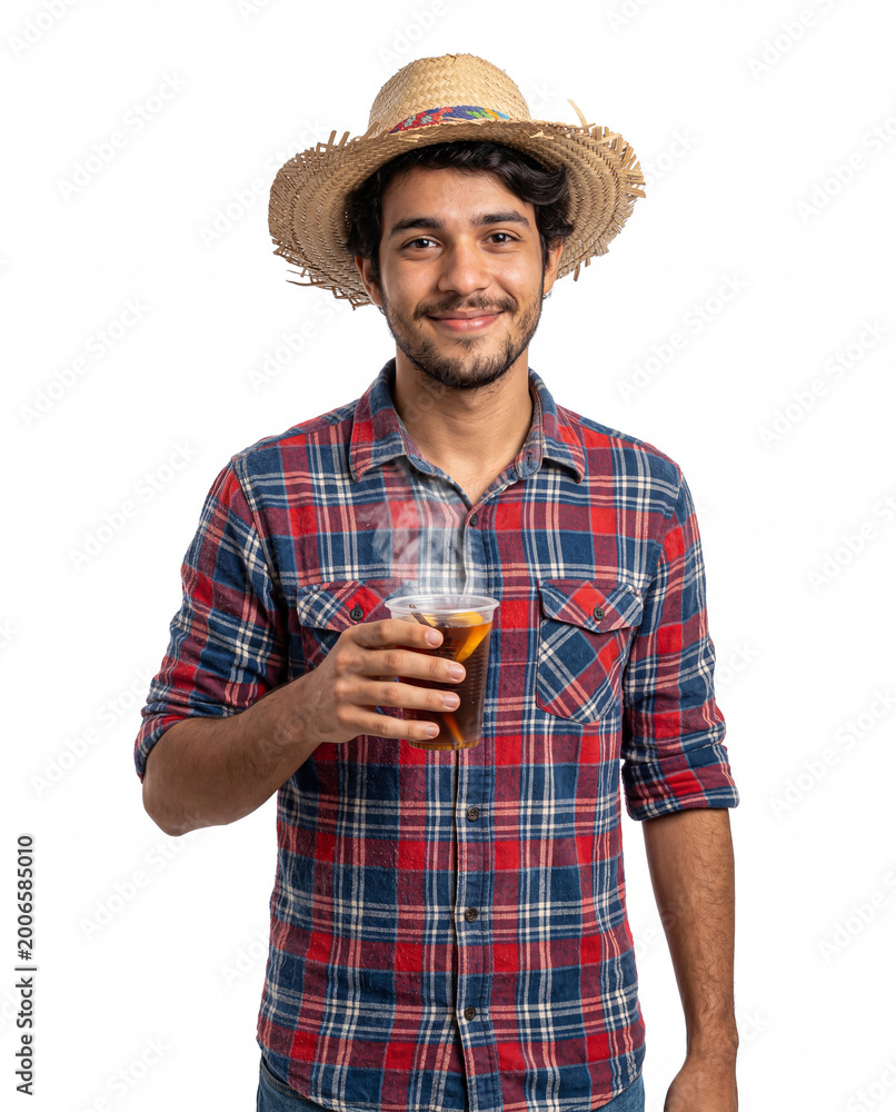 Fototapeta premium Smiling Young Man with Straw Hat and mulled wine for Festa Junina