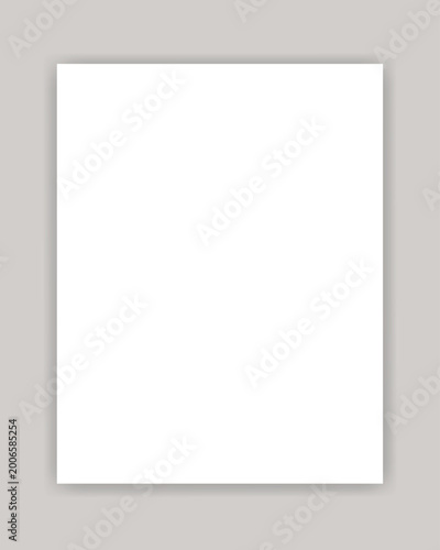  blank white paper with shadow on gray background