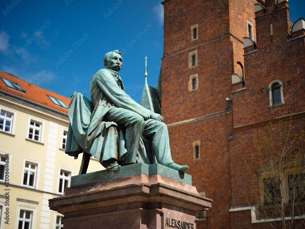 Fototapeta premium Wroclaw, Poland, 24th April 2026, statue sculpture of Aleksander Fredo outside the Wroclaw Old Town Hall aka Ratusz 