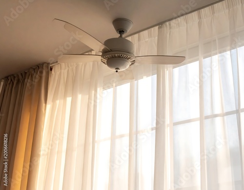 Ceiling fan near window.