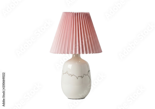 Pink and white striped lampshade on a ceramic lamp base