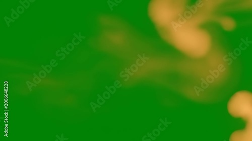 Blurry Yellow Object on Green Background.