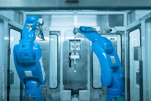 Chemotherapy drug compounding robot with syringe and medicine bottle.Hihg technology pharmaceutical production vaccine concept.New innovation.