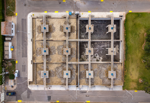 Принти на полотні Overhead view of activated sludge aeration tanks in a wastewater treatment facil