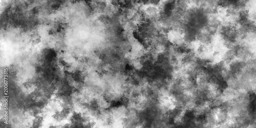 Abstract black and white grunge texture background. Grey ink splash or watercolor stain pattern. Distressed rough cloud noise for modern wall or paper design. Monochrome dirty  fume overlay.