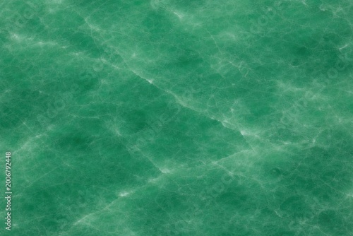 Imperial Jade Texture Seamless Pattern. Close-up imperial jade gemstone surface detail. Luxury green mineral pattern design. Realistic jade texture background. Detailed polished macro close-up. 