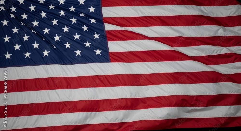 Fototapeta premium American flag waving with red white and blue colors and stars